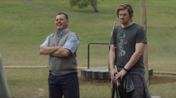 Grey Slim Fit V Neck Sweater Vest worn by Official#1 (Alan Dukes) in Little Monsters