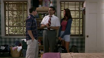 Camiseta sin mangas rosa usada por Nadia (Shannon Elizabeth) en American Pie
