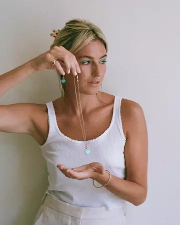 White tank top worn by Camille Charriere on @camillecharriere