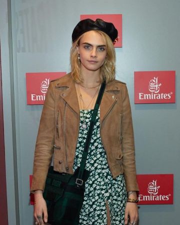 Saint Laurent en daim perfecto porté par Cara Delevingne Us Open Tennis Championships le 7 septembre 2019