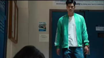 Adidas X Pharrell Williams Green hu holi superstar track jacket worn by Zach Dempsey (Ross Butler) in 13 Reasons Why (S03E02)