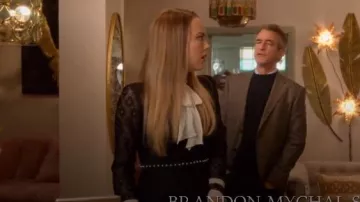 Sandro black horse lace dress worn by Ainsley Howard (Rebecca Rittenhouse) in Four Weddings and a Funeral (S01E10)