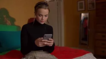 Claudie Pierlot Beige High-waist pleated checked woven mini skirt worn by Ainsley Howard (Rebecca Rittenhouse) in Four Weddings and a Funeral Season 1 Episode 10