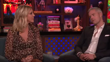 Caroline Constas Bette leopard print twist front blouson sleeve top worn by Andy Cohen on Watch What Happens Live with Andy Cohen SEPTEMBER 11, 2019