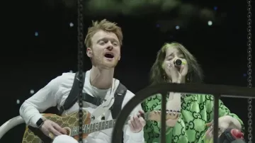 Gucci green GG sweater worn by Billie Eilish in Billie Eilish - i love you (Live At The Greek Theatre)