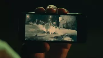 Apple iPhone used by Chubby (Bryant Tardy) in Queen & Slim