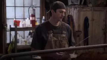 Carharrt Tan Men’s Duck Bib Unlined Overall R01 worn by Colt Bennett (Ashton Kutcher) in The Ranch Season 4 Episode 3