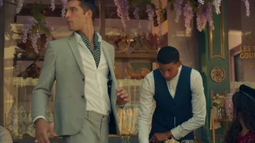 The gray pants worn by an extra in the movie clip Liar of Camila Cabello