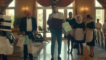 The pants right petrol blue worn by an extra in the movie clip Liar of Camila Cabello