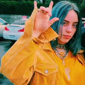 Kenzo Orange Corduroy jacket worn by Billie Eilish on Instagram picture