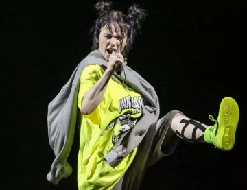 Vanguard Neon Yellow Tee shirt worn by Billie Eilish for her concert at Atlanta, Georgia, USA. 23rd June, 2019