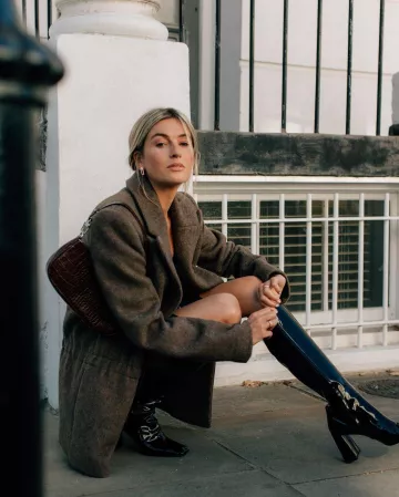 Prada boots worn by Camille Charriere on the Instagram account @camillecharriere