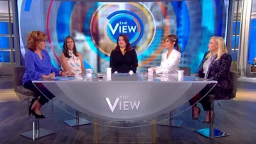 Jonathan Simkhai charmeuse wrap front bodysuit worn by Sunny Hostin on The View September 20, 2019