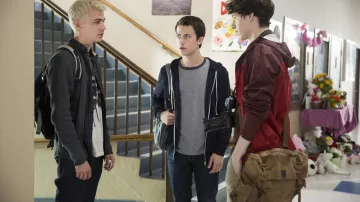 The large purse worn by Tyler Down (Devin Druid) in the series, 13 Reasons Why (S01E03)