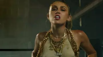 Chanel gold necklace pendant worn by Miley Cyrus in Don’t Call Me Angel (Charlie’s Angels) music video with Ariana Grande, Lana Del Rey