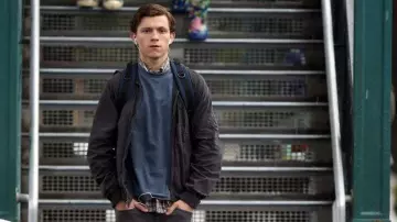Navy blue Zip Windbreaker Jacket worn by Peter Parker (Tom Holland) in Spider-Man: Homecoming outfits