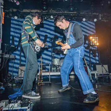 Overalls worn by Dylan Minnette as seen on the In­sta­gram Ac­count of @Wal­lowswal­lows