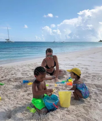 Stella cove neon swim trunks green worn by Saint West Instagram Pic September 23, 2019