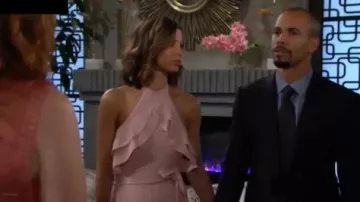 Avec les filles blush pink ruf­fle hal­ter neck jump­suit worn by Elena Dawson (Brytni Sarpy) as seen on The Young and the Restless September 26, 2019