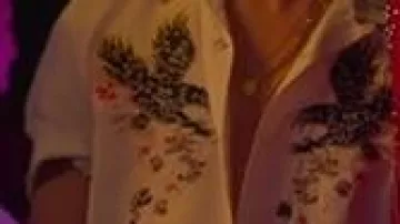 The white Diesel shirt with eagle patterns worn while dancing by Valerio (Jorge Lopez) in the Elite series (S02E04)