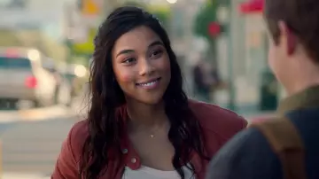 Pink motorcycle style denim jacket of Cate (Alexandra Shipp) in Jexi