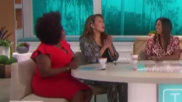 Alice + Olivia Gloriane Snake print crop pants worn by Carrie Ann Inaba on The Talk October 1, 2019