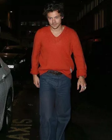 Gucci Washed Denim Flare Pants usado por Harry Styles Cena en Londres 28 de septiembre de 2019