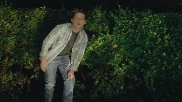 The plaid shirt beige with Charlie Puth in her video clip Mother