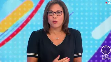 El vestido negro de cuello en V de Karine Baste-Regis en Télématin