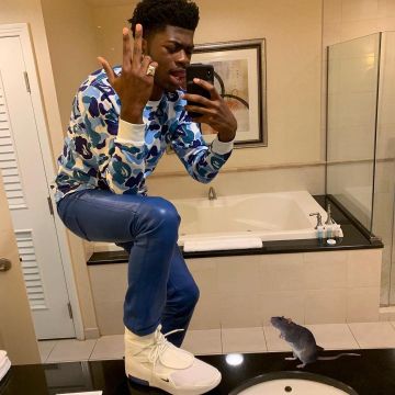 The t-shirt long sleeve blue bape Lil Sin X on the account Instagram of @lilnasx