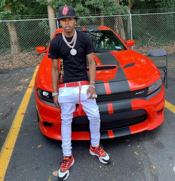The red belt Louis Vuitton leather Lil Baby on the account Instagram of @lilbaby_1