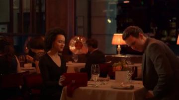 Ted Baker Red Velvet brocade tassel clutch worn by Maya (Nathalie Emmanuel) in Four Weddings and a Funeral Season 1 Episode 10