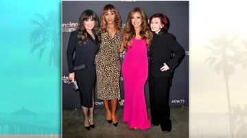 Nicholas Leop­ard Print Belt­ed Silk Mi­di Dress worn by Eve on The Talk October 9, 2019