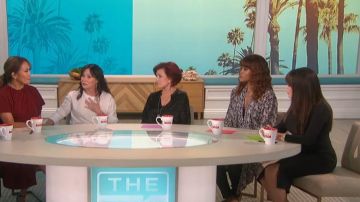 Good American Python-Print sheer chiffon kimono jacket worn by Eve on The Talk October 10, 2019