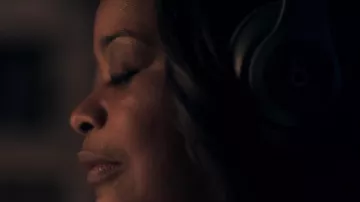 Beats by dr Dre headphones worn by Poppy Parnell (Octavia Spencer) as seen in Truth Be Told (Season 1)