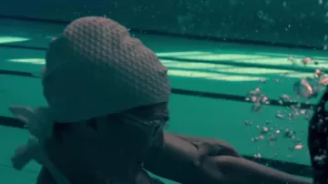 Swimming cap worn by Elizabeth Perkins as seen in Truth be Told (Season 1)