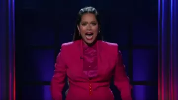 Escada be­gasi wool tuxe­do jack­et worn by Lilly Singh on A Little Late with Lilly Singh September 19, 2019