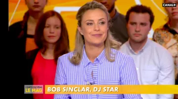 The striped shirt contrasting cuffs of Isabelle Moreau in The Info of the true 15.10.2019