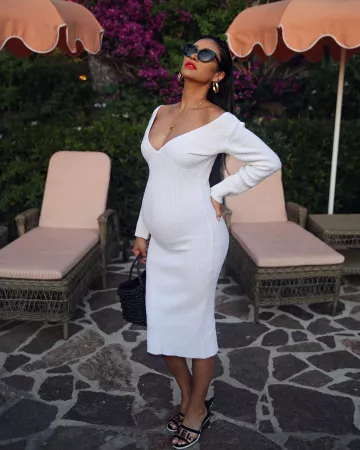 The white dress figure-hugging Shay Mitchell on the account Instagram of @shaymitchell