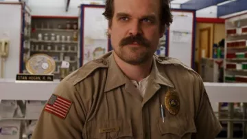 The badge (name) Jim Hopper (David Harbour) in Stranger Things