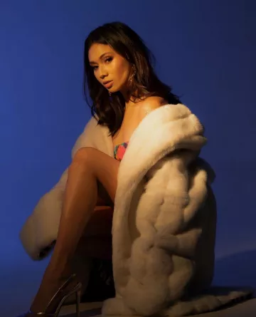 Matt Sarafa floor length white faux fur worn by Niki on the Instagram account @nikizefanya