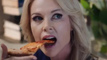 The earrings curved Megyn Kelly (Charlize Theron) in Scandal