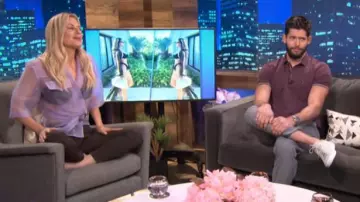 Nanushka Dalas Wrap-Effect Sheer Top worn by Morgan Stewart on E! News October 17, 2019