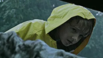 The waxed yellow worn by Georgia (Jackson Robert Scott) in It