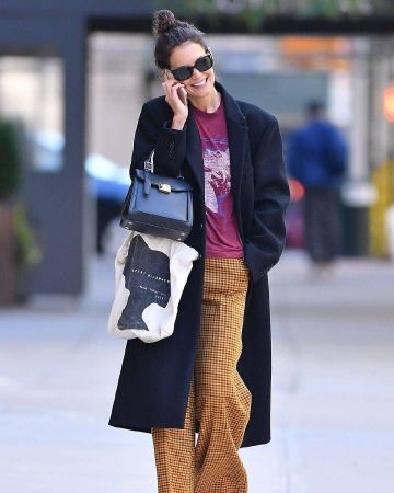 Khaite Bernadette checked wool wide leg pants worn by Katie Holmes New York City October 19, 2019