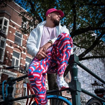 The pants pink and blue patterned Nike SB X parra carried by Gibs on the account Instagram of @tonton_gibs 