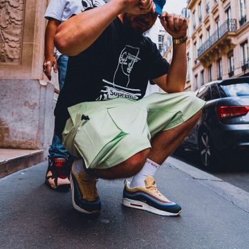 The pair of sneakers nike air max 97 sean multiclore scope by Gibs on the account Instagram of @tonton_gibs 