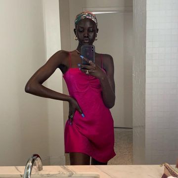 Pink dress Adut Akech account on the Instagram of @adutakech