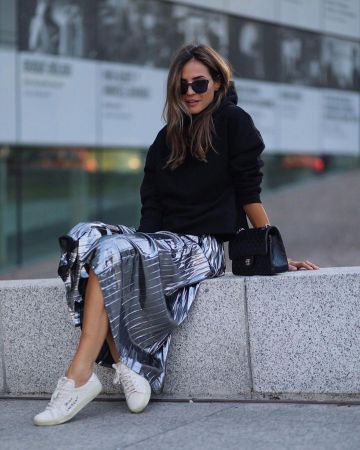 Zapatillas de cuero blanco blanco de Silvia Zamora en la cuenta de Instagram @ladyaddict