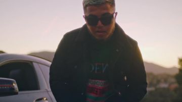 The sweater turtleneck Loewe jacquard designs from Hamza in his clip HS feat. SCH